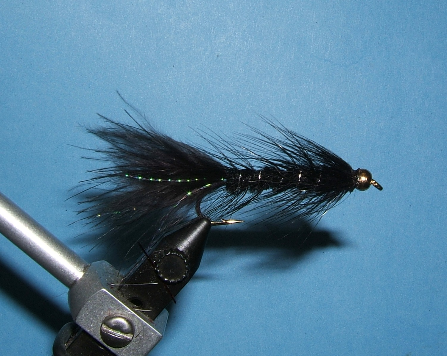 Woolly Bugger black plain?bead head; # 12. 12 streamers 